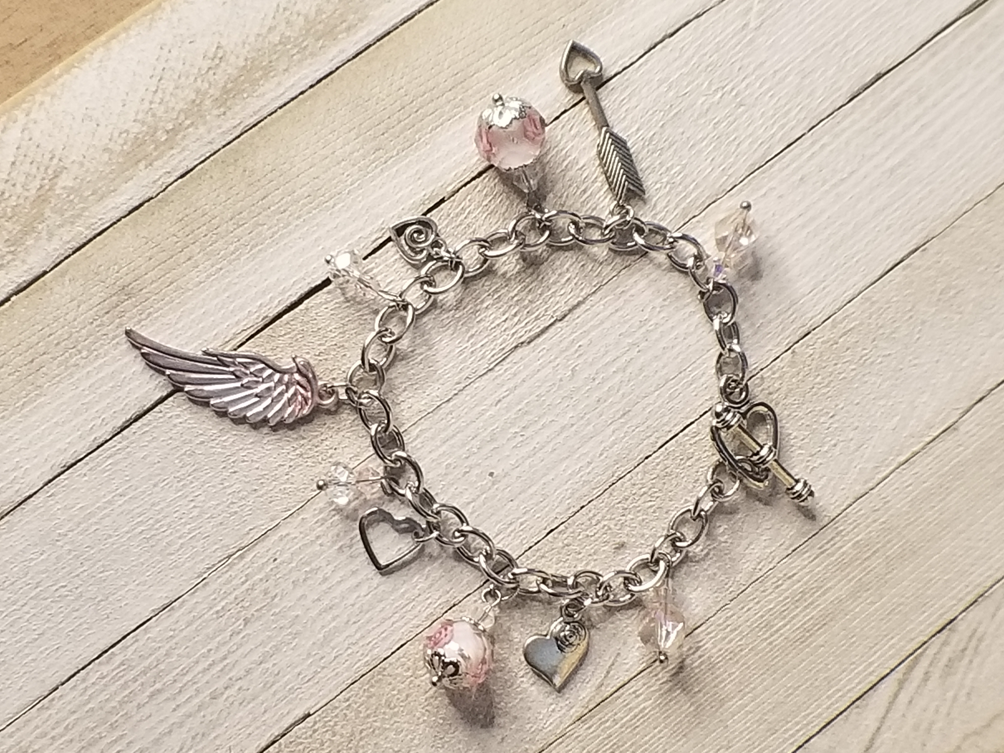 Pink Angel Wing Charm Bracelet